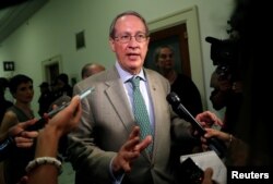 FILE - House Judiciary Committee Chairman Bob Goodlatte, R-Va., answers reporters' questions in the Rayburn House Office Building in Washington, July 13, 2018.