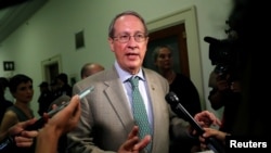 FILE - House Judiciary Committee Chairman Bob Goodlatte, R-Va., answers reporters' questions in the Rayburn House Office Building in Washington, July 13, 2018.