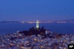 In the distance behind Coit Tower atop Telegraph Hill, lies the “inescapable” Alcatraz Prison. A few convicts escaped took their chances in the bay’s icy waters. None is thought to have made it to shore.
