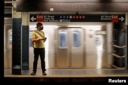 The $1 trillion bipartisan infrastructure plan passed by the US Senate in August, includes money to shore up public transportation like New York City's subway, May 3, 2021.