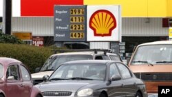 Gas prices are displayed at a Shell station in Beaverton, Ore., April 24, 2012. 