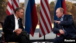 Presidents Barack Obama and Vladimir Putin met last June in Northern Ireland, but a planned summit next month is cancelled.