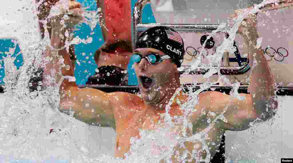 Tyler Clary of the U.S. celebrates winning the men's 200m backstroke final with an Olympic record.