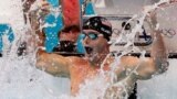 Tyler Clary of the U.S. celebrates winning the men's 200m backstroke final with an Olympic record.