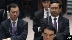 Chinese Ambassador to the United Nations Li Baodong addresses the Security Council in New York after a vote on a U.N. resolution backing an Arab League peace plan on the Syrian crisis, February 4, 2012.