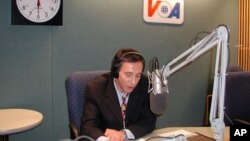 Ferdinand Ferella conducting an interview from a VOA studio, (File).