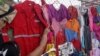 Venezuela Oil Workers Sell Boots, Uniforms for Food