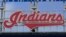 The Indians sign hangs at Progressive Field before the first baseball game of a doubleheader against the Chicago White Sox, Sept. 23, 2021, in Cleveland.