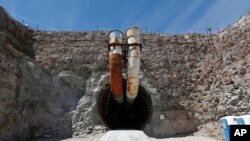 FILE - This photo shows the south portal of the proposed Yucca Mountain nuclear waste dump near Mercury, Nevada, April 9, 2015. 