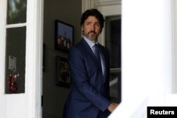 FILE - Canada's Prime Minister Justin Trudeau arrives for a news conference in Ottawa, Canada on July 6, 2020.