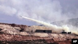 Turkish artillery fires toward Syrian Kurdish positions in Afrin area, Syria, from Turkish side of the border in Hatay, Turkey, Feb. 9, 2018. Turkish jets have resumed airstrikes in the Syrian Kurdish-run enclave of Afrin, the military and media reports.