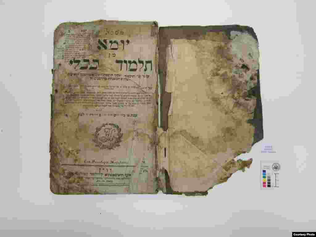 A Babylonian Talmud before restoration. This volume of the Talmud discusses laws and topics relating to Yom Kippur, the Day of Atonement. (U.S. National Archives)