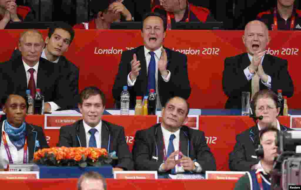 俄羅斯總統普京﹑英國首相卡梅倫和外相黑格一齊觀看女子78公斤級柔道比賽 -- 美國的哈里森對英國的吉本斯。