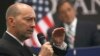 FILE - U.S. Admiral James Stavridis answers a question during a news conference at NATO headquarters in Brussels, Belgium in 2011. 