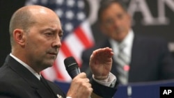 FILE - U.S. Admiral James Stavridis answers a question during a news conference at NATO headquarters in Brussels, Belgium in 2011. 