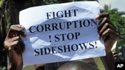 Kenyans demonstrate on 17 Feb 2010 to vent their anger at a coalition government falling apart over graft allegations and its inability to further pledged reforms