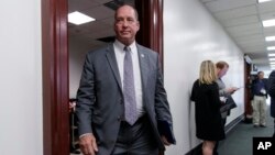 FILE - Rep. Ted Yoho, R-Fla., leaves a closed-door strategy session with Speaker of the House Paul Ryan, R-Wis., and the leadership at the Capitol, in Washington, March 28, 2017. 