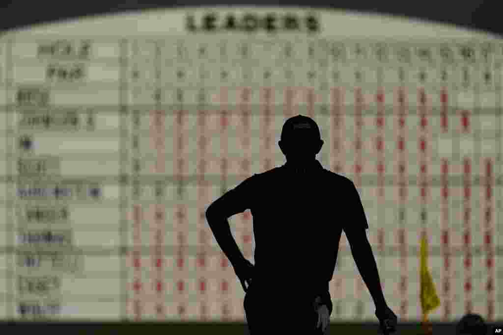 Patrick Cantlay waits to putt on the 17th green during the first round of the Masters golf tournament in Augusta, Georgia.