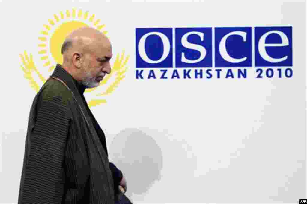 Afghan President Hamid Karzai arrives for the OSCE Summit at the Palace of Independence in Astana, Kazakhstan, Wednesday, Dec. 1, 2010. The OSCE Summit offers a unique opportunity to address urgent security challenges including transnational threats such