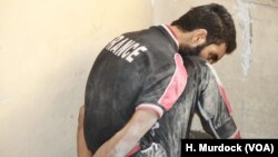 An Islamic State militant is detained in Mosul, Iraq, July 5, 2017. While many IS militants fought to the death in Mosul, some suspects were detained or surrendered during ongoing fighting. 