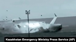 Azerbaijan Airlines' Embraer 190 crash lands near the airport of Aktau, Kazakhstan, in this image from video released by Kazakhstan Emergency Ministry Press Service on Dec. 27, 2024.