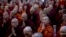 FILE - Controversial Buddhist monk Wirathu, second right foreground, who is accused of instigating sectarian violence between Buddhists and Muslims through his sermons.
