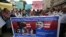 Supporters of Pakistani civil society groups protest in favor of the Christian community in Karachi, Pakistan, Feb. 26, 2018. An official said Sajid Masih, a Christian blasphemy suspect, who suffered serious injuries after jumping off a federal building, is now in stable condition. 