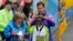Boston Mayor Marty Walsh crowns Caroline Rotich of Kenya, after she won the women&#39;s division of the Boston Marathon, April 20, 2015.