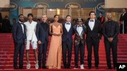 John Washington, from (L), Damaris Lewis, Jasper Paakkonen, Laura Harrier, Topher Grace, Spike Lee, Adam Driver, Corey Hawkins at the 'BlacKkKlansman' premiere at the 71st international film festival, Cannes, France, May 14, 2018.