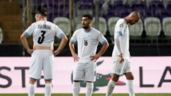 FILE—Israel players react at the end of the Euro 2024 qualifying play-off soccer match between Israel and Iceland, at Szusza Ferenc Stadium in Budapest, Hungary, March 21, 2024.