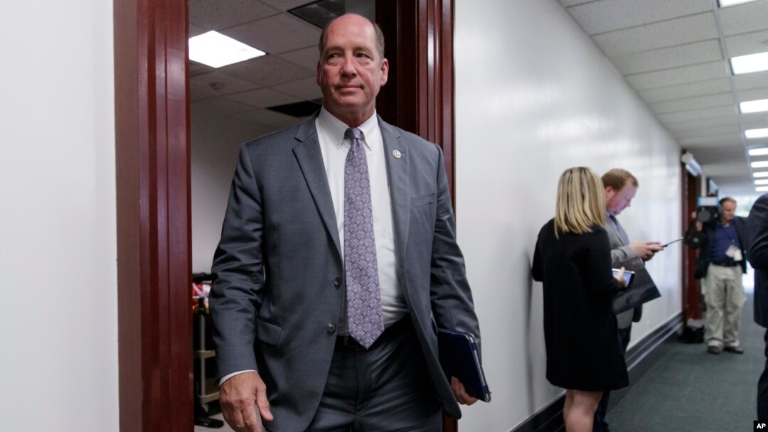 FILE - Rep. Ted Yoho, R-Fla., leaves a closed-door strategy session with Speaker of the House Paul Ryan, R-Wis., and the leadership at the Capitol, in Washington, March 28, 2017. 