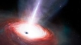 An artist's illustration shows a rapidly feeding black hole that is emitting powerful gas outflows. (NOIRLab/NSF/AURA/J. da Silva/M. Zamani/Handout via REUTERS)