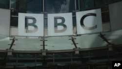 FILE - A logo of the BBC marks BBC headquarters in London, Britain, July 11, 2023.