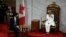 Canadian Prime Minister Justin Trudeau speaks with Governor General Julie Payette before she reads the speech from the throne in the Senate chamber in Ottawa, Sept. 23, 2020, in Ottawa, Ontario. 