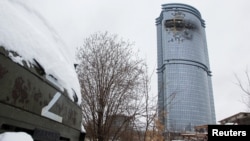 A multi-story residential building shows damage after an alleged Ukrainian drone attack in Kazan, Russia, Dec. 21, 2024. 