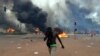 Manifestantes põem fogo no parlamento de Burkina Faso para impedir votação
