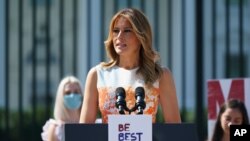 FILE - First lady Melania Trump speaks at an event celebrating the 100th anniversary of the 19th amendment which afforded the vote to women, at the White House, Aug. 24, 2020, 