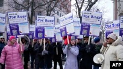 FILE - Supporters demonstrate at a Joe Biden Write-In Rally in Manchester, New Hampshire, on January 20, 2024.