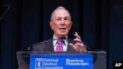 FILE - Michael Bloomberg announces his organization, Bloomberg Philanthropies, will give $600 million to the endowments of the four historically Black medical schools at the National Medical Association convention, Aug. 6, 2024, in New York 