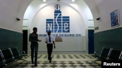 Investors walk out of the Nairobi Stock Exchange in Kenya's capital Nairobi, Mar. 4, 2010. 