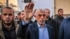 FILE - Yahya Sinwar, the Gaza Strip leader of Hamas, waves to supporters as he attends a rally in Gaza City, April 14, 2023. Israel said on Oct. 17, 2024, that its military may have killed Sinwar in an operation in the Gaza Strip.