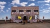 FILE - Navajo and Hopi arts and crafts are promoted on the facade of a storefront in Winslow, Arizona, Oct. 15, 2024.