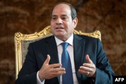 FILE - Egypt's President Abdel Fattah al-Sisi meets with the US Secretary of State (not pictured) in Cairo on October 15, 2023.