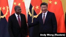 Presidente angolano, João Lourenço, com o Presidente chinês, Xi Jinping, durante a cimeira China África em Pequim, 2 de setembro de 2018
