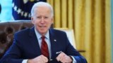 President Joe Biden prepares to sign executive orders on affordable healthcare in the Oval Office of the White House in Washington on Jan. 28, 2021.