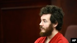 FILE - Accused movie theater shooter James Holmes in seen in a March 27, 2013, courtroom photo.