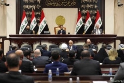 Members of the Iraqi parliament are seen at the parliament in Baghdad, Iraq January 5, 2020. Iraqi parliament media office/Handout via REUTERS