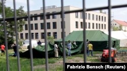 Brandenburg eyaletindeki Eisenhuettenstadt, kentinde bulunan mülteci kampı. 