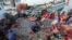 Myanmar workers work on fishing boats at a pier in Prachuabkhirikhant province, southern Thailand, file photo. 