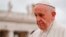 FILE - Pope Francis arrives in St. Peter's Square at the Vatican, April 11, 2018.
